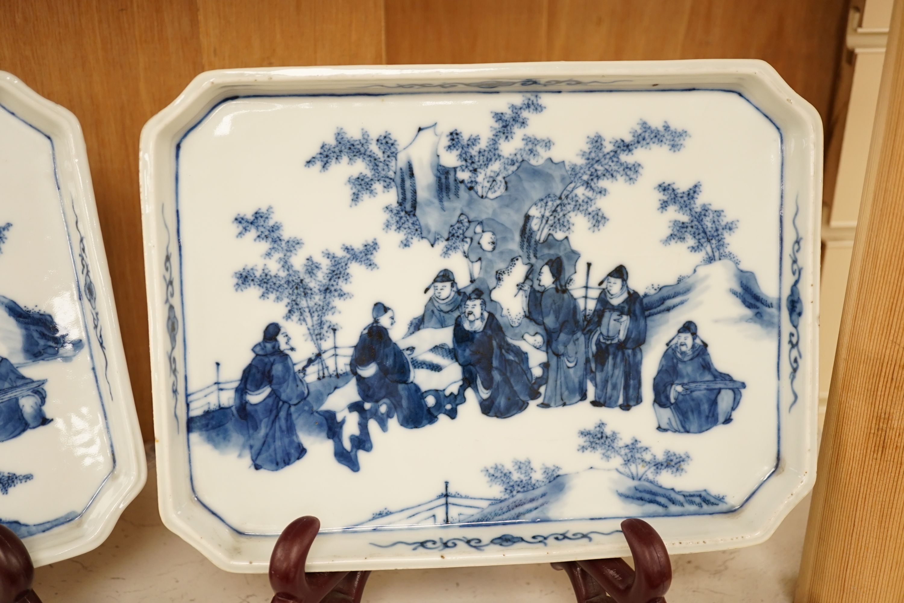 A pair of 19th century Chinese blue and white ‘Seven Sages of the bamboo grove’ dishes, 23.5cm long